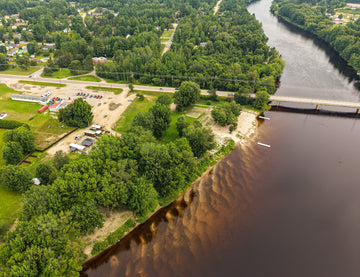 Aerial view of the campground beside the river